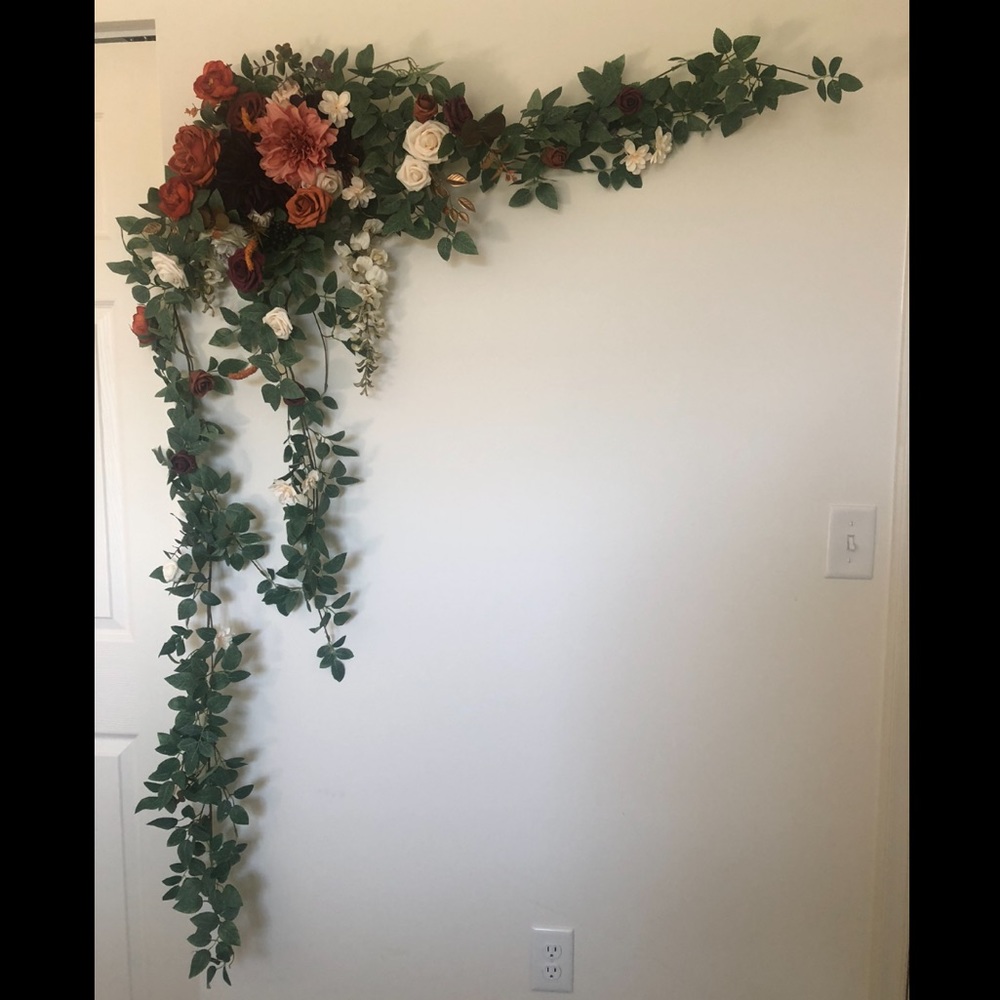 Arch arrangement. Lings moment flowers. Terracotta.